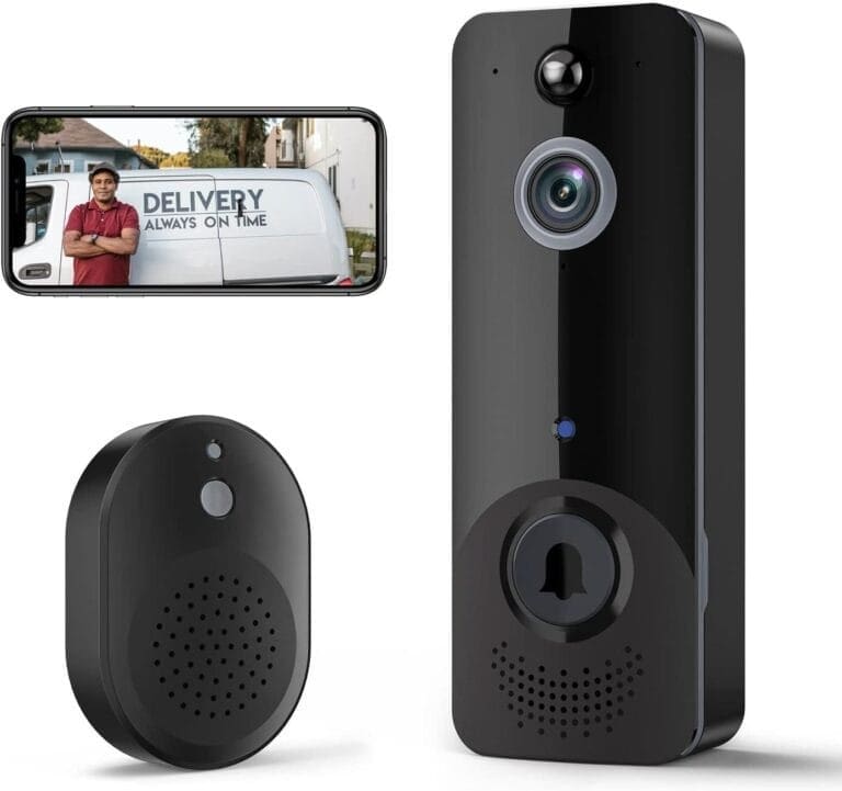 A doorbell with a camera and a phone next to it.